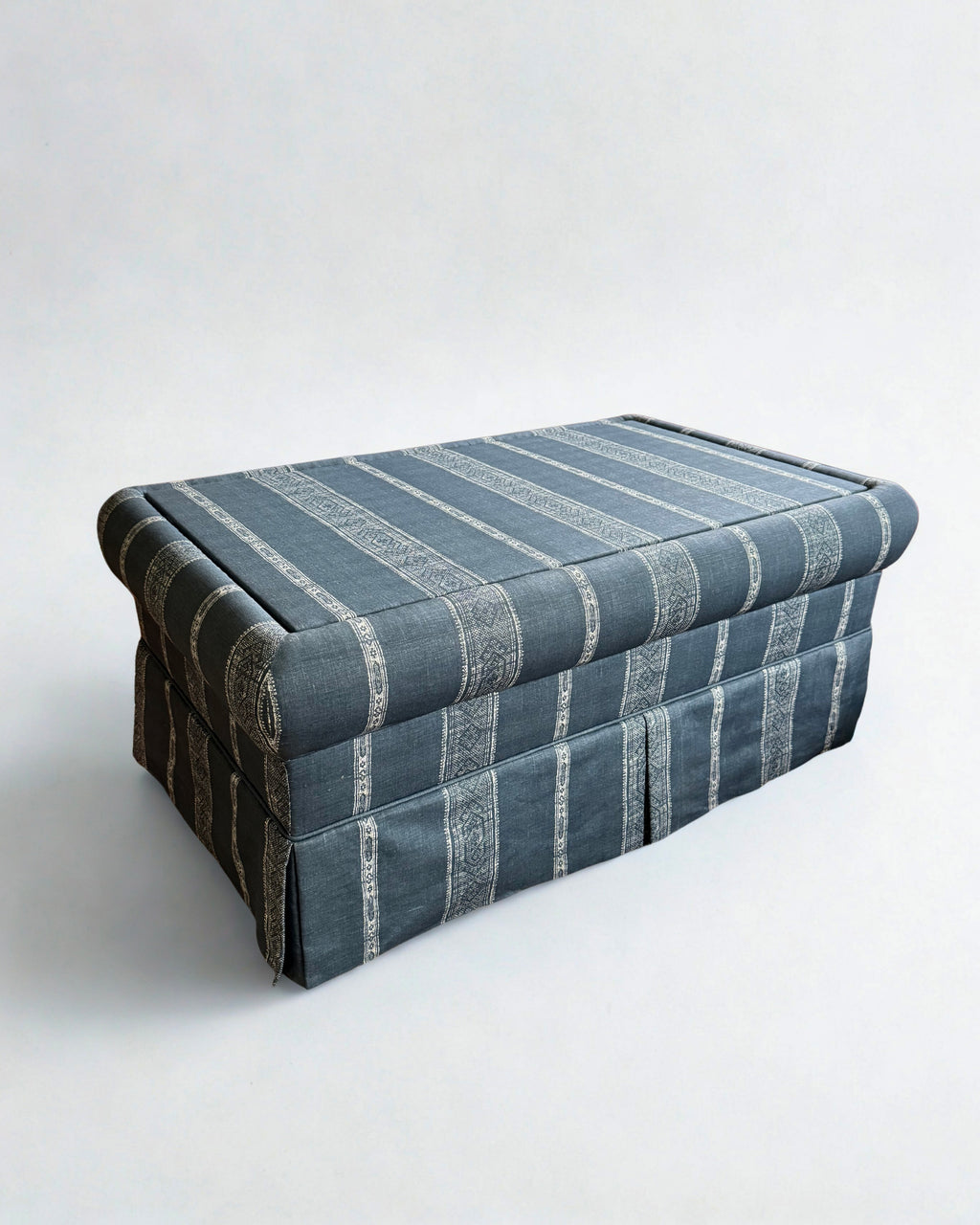 Ottoman Footstool - covered in Carolina Irving Patmos Reverse in Navy