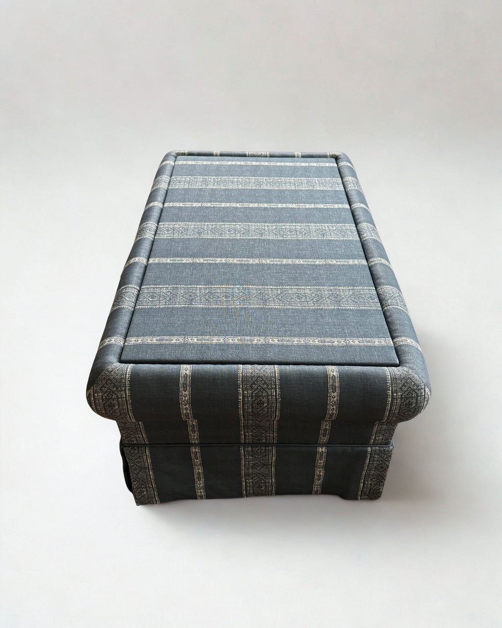 Ottoman Footstool - covered in Carolina Irving Patmos Reverse in Navy